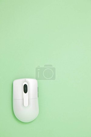 Photo for Wireless computer mouse on green background - Royalty Free Image