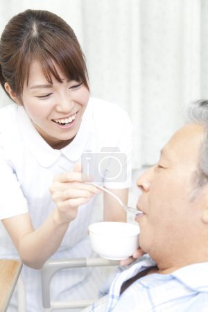 Photo for Nurse with patient in hospital - Royalty Free Image
