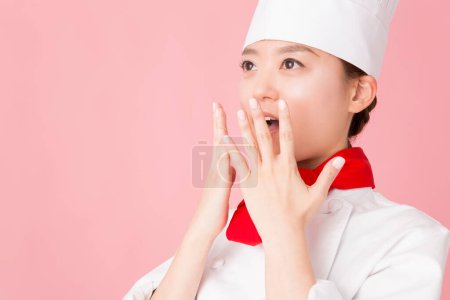 Photo for Portrait of a beautiful young woman chef is surprised - Royalty Free Image