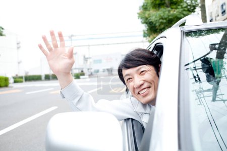 Foto de Joven asiático hombre en un coche - Imagen libre de derechos
