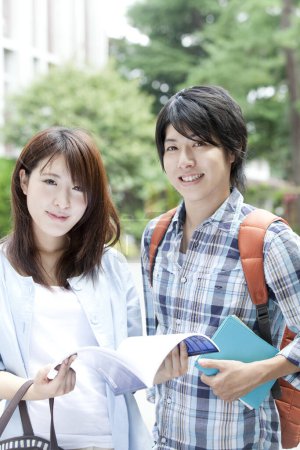 Photo for Smiling young Japanese students at university - Royalty Free Image