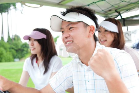 Photo for Portrait of young asian golf players in car - Royalty Free Image
