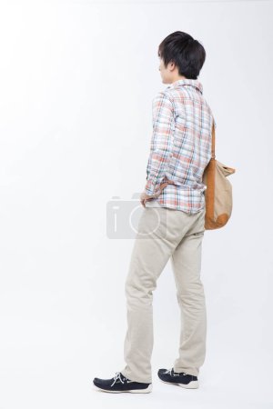 Photo for Asian man with  bag on isolated background - Royalty Free Image