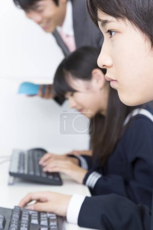 Photo for Portrait of asian students with teacher in computer class - Royalty Free Image