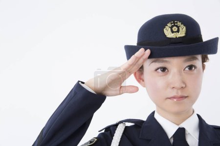 Photo for Studio portrait of Japanese female police officer - Royalty Free Image