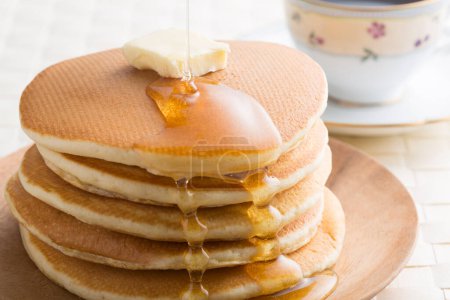 Photo for Close up view of delicious pancakes with honey - Royalty Free Image