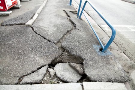 Photo for Cracked asphalt road surface after earthquake - Royalty Free Image