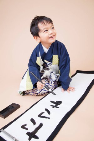 Photo for Japanese boy in kimono drawing - Royalty Free Image