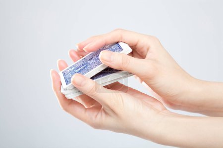 Photo for Female hands with playing cards, close up view - Royalty Free Image