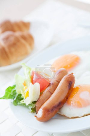 Photo for Fried eggs with sausages - Royalty Free Image