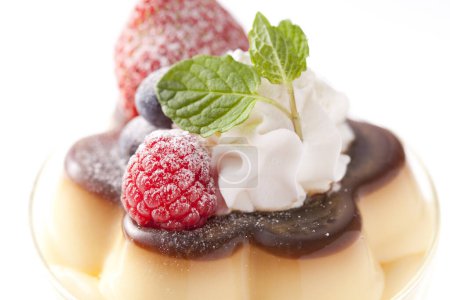 Photo for Chocolate pudding with cream and fresh berries - Royalty Free Image