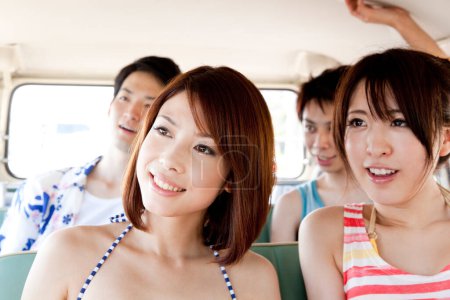 Photo for Portrait of young asian friends going to beach in van - Royalty Free Image