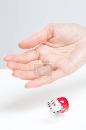 Photo for Hand throwing dices close up - Royalty Free Image