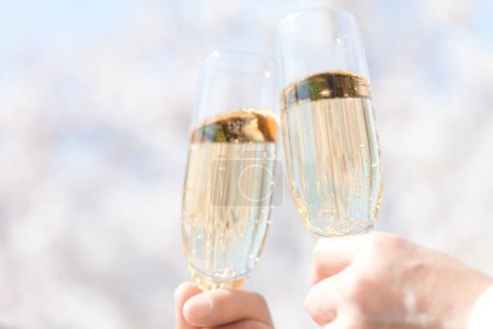 Photo for Close up of champagne glasses on blurred background - Royalty Free Image