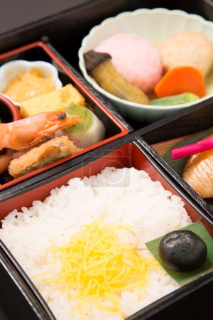 Photo for Various delicious Asian food in bento - Royalty Free Image