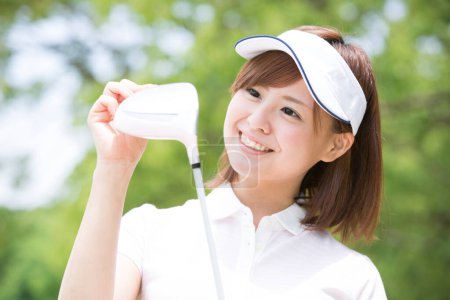 Téléchargez les photos : Asiatique femme golfeur avec golf club - en image libre de droit