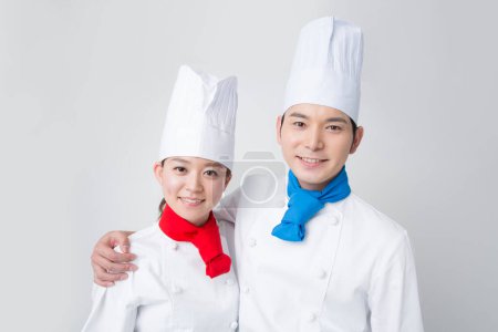 Foto de Retrato de estudio de jóvenes chefs japoneses en uniforme blanco - Imagen libre de derechos