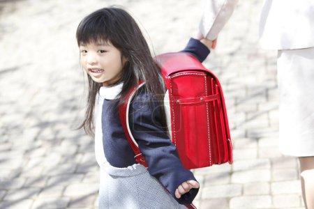 Photo for Close up portrait of beautiful asian schoolgirl posing at park - Royalty Free Image
