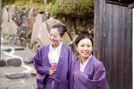 young women in traditional japanese costumes