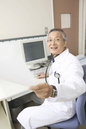 Photo for Asian doctor working in the hospital - Royalty Free Image