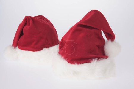 Photo for Santa claus red hats on white background - Royalty Free Image