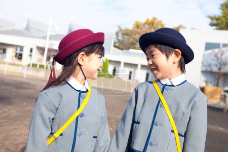 Photo for Two cute Japanese children in elementary school - Royalty Free Image