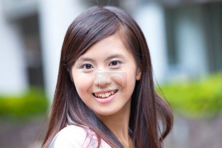 Photo for Close up outdoor portrait of young beautiful asian woman student - Royalty Free Image