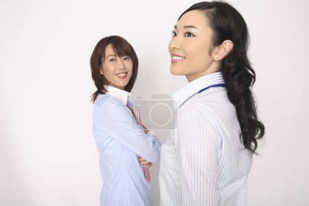 Photo for Portrait of two young asian businesswomen - Royalty Free Image
