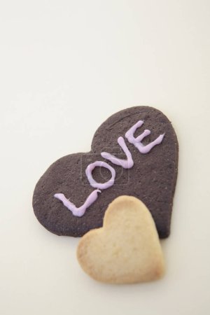 Photo for Freshly baked delicious heart shaped cookies. Valentines day concept - Royalty Free Image