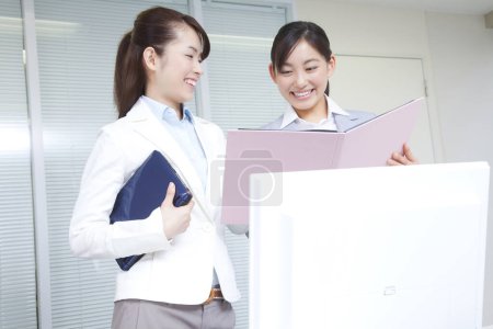 Photo for Portrait of beautiful Japanese businesswomen in office - Royalty Free Image