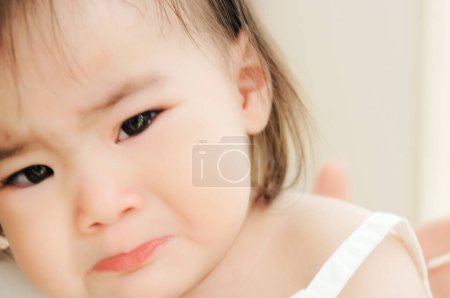 Photo for Baby crying on the white background - Royalty Free Image