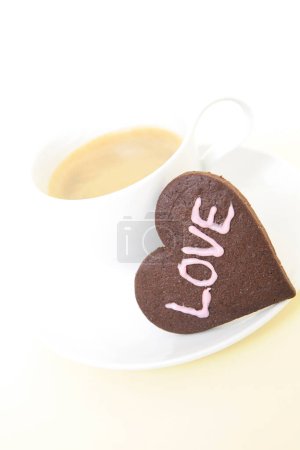 Photo for Cup of coffee and delicious heart shaped cookie. Valentines day concept - Royalty Free Image