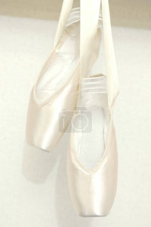 Foto de Ballet shoes on white background, close up - Imagen libre de derechos