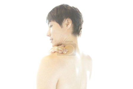 Foto de Mujer con dolor de espalda sobre fondo blanco - Imagen libre de derechos