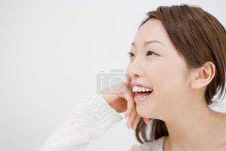 Photo for Close up portrait of smiling asian woman - Royalty Free Image