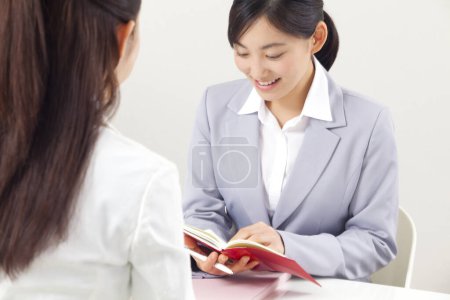Photo for Portrait of beautiful Japanese businesswomen in office - Royalty Free Image