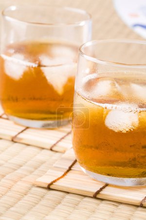 Photo for Close up view of cold tea with ice cubes - Royalty Free Image