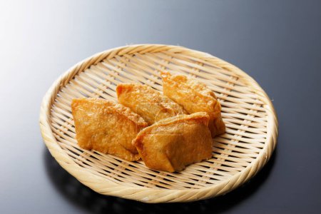 close up view of Seasoned Rice Wrapped In Fried Tofu Bags