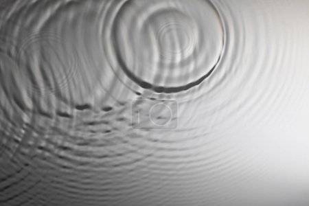 Photo for Drop trace on liquid surface. droplet ripple. abstract background - Royalty Free Image