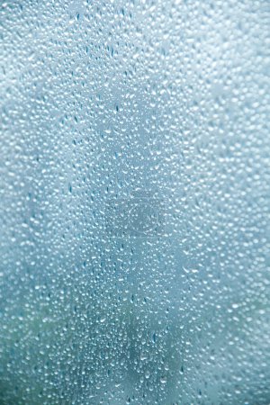 Photo for Glass window covered with water droplets - Royalty Free Image