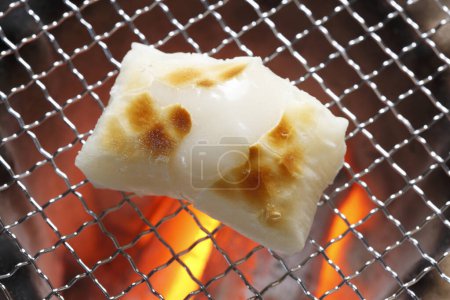 Photo for Close up view of delicious Rice Cake on grill - Royalty Free Image