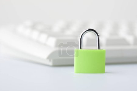 Photo for Computer keyboard and green lock. Security concept - Royalty Free Image