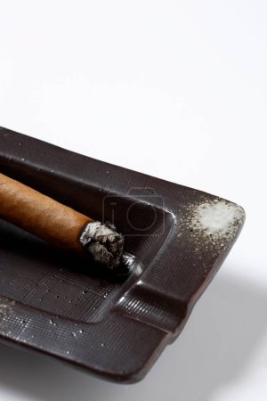 Photo for Ashtray with cigar on white background - Royalty Free Image