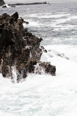 Photo for Sea waves crashing on rocks - Royalty Free Image
