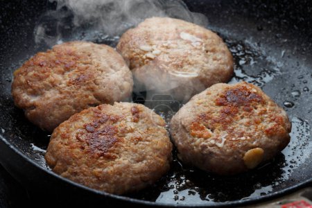 Photo for Meat cutlets on frying pot - Royalty Free Image