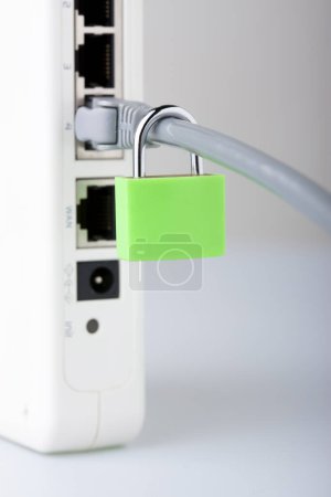 Photo for Computer network cable with lock on white background. Secure internet connection concept - Royalty Free Image