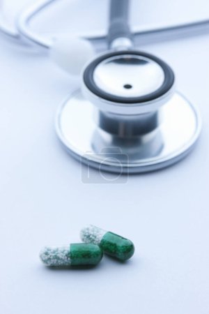 Photo for Medical stethoscope and pills  on isolated  background - Royalty Free Image
