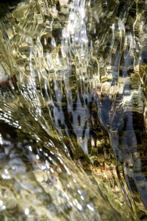 Photo for Close up view of water flowing in fast stream - Royalty Free Image