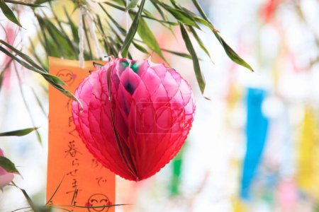 Photo for Beautiful decorations hanging on street during Tanabata or star festival - Royalty Free Image