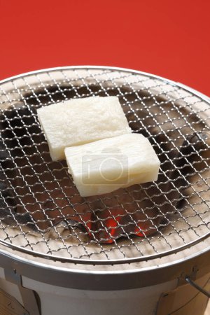 Photo for Close up view of delicious Rice Cakes on grill - Royalty Free Image